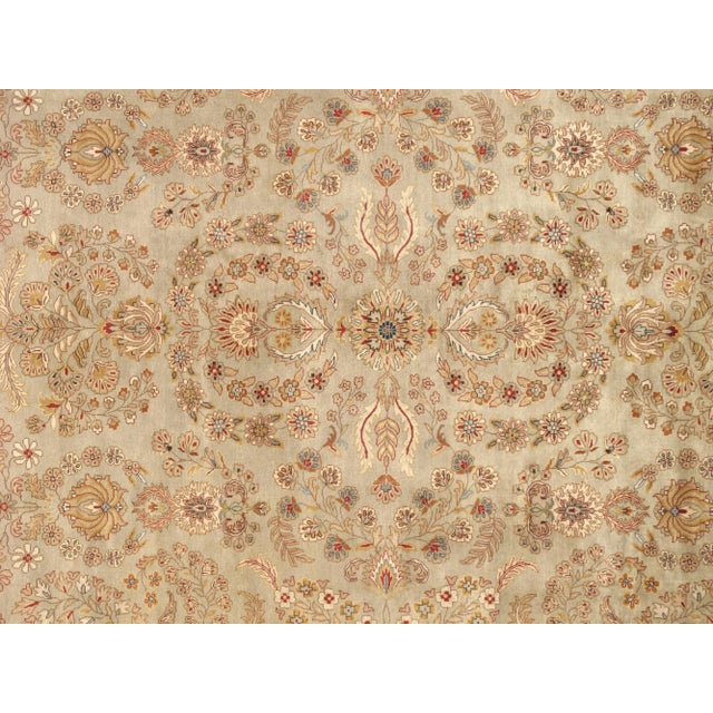 Elevate your space with timeless elegance through our Tabriz hand-knotted area rug, a luxurious masterpiece meticulously...