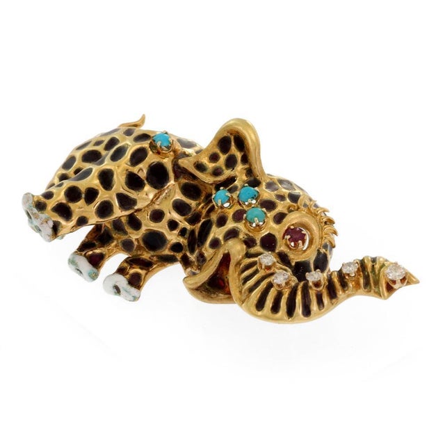 This is a beautiful sculpted and adorable baby elephant brooch, it is crafted from 18k yellow gold featuring a 3D full...