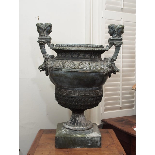 An antique, 19th century French bronze garden urn, signed F. A. D. and after the 17th century model by Claude Ballin,...