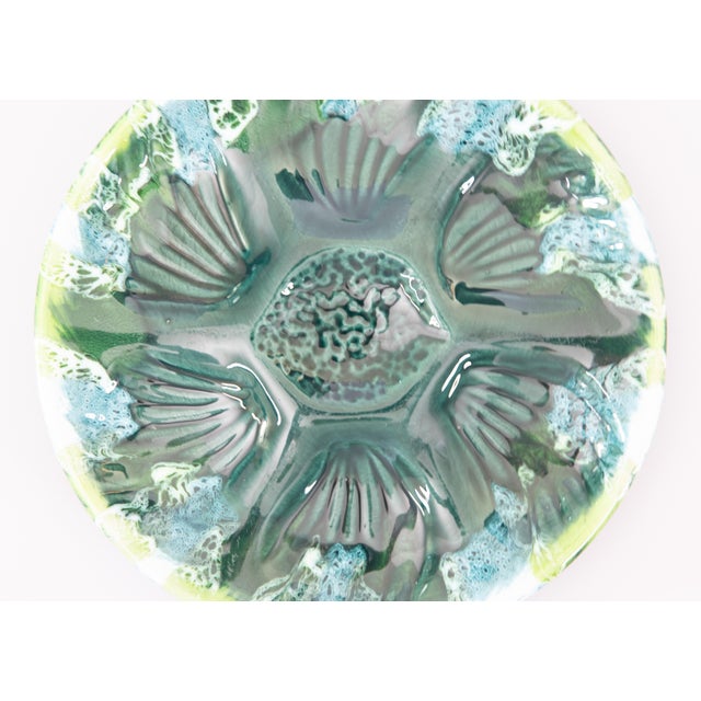 A gorgeous vintage French Vallauris oyster plate in lovely shades of green and turquoise from the South of France, circa...