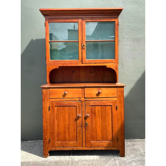 This handsome antique primitive pine hutch exudes authentic rustic charm and timeless character, making it a standout...