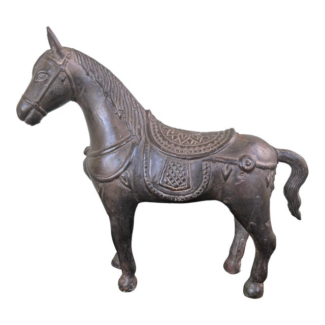 Vintage Cast Metal Horse Sculpture With Ornate Saddle Detailing For Sale