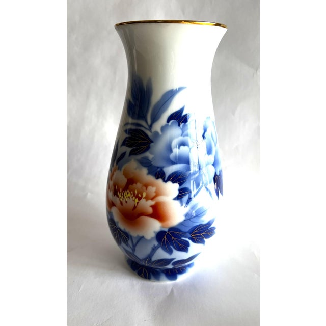 Fukagawa porcelains are known for their pristine porcelains and fine designs. This elongated globular shape vase with a...