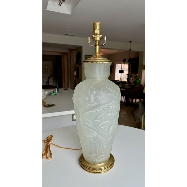 Single vintage Chinoiserie raised satin glass table lamp featuring embossed tropical bird designs, in the manner of Muller...