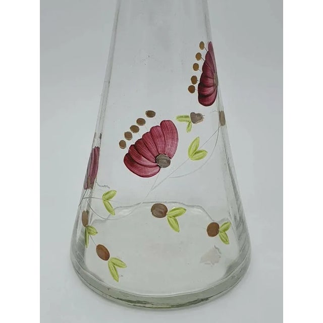 Caraffa of the 70s in hand painted glass with floral decorations and cap. Particular and scenographic to be placed inside...