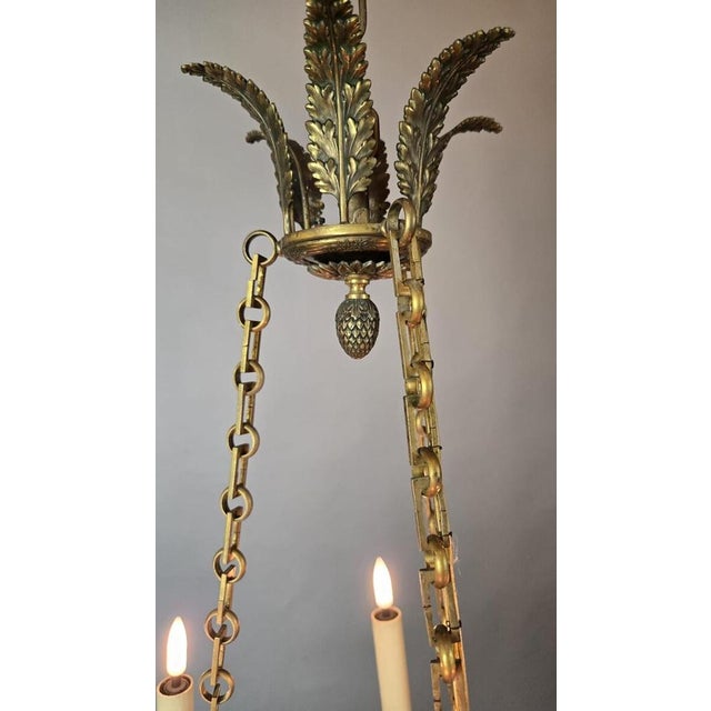 Pair of Empire Chandeliers in Sheet Metal, Bronze and Brass, 19th Up to 250V (Europe/UK Standard).The wiring of this item...