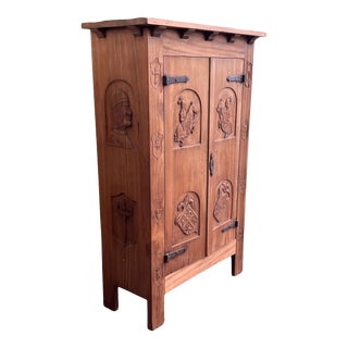 Spanish Gothic Style Walnut Entry Wardrobe With Five Hangers and Carvings For Sale