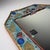A unique and highly decorative italian wall mirror crafted on the island of murano by the now-closed artisan studio...