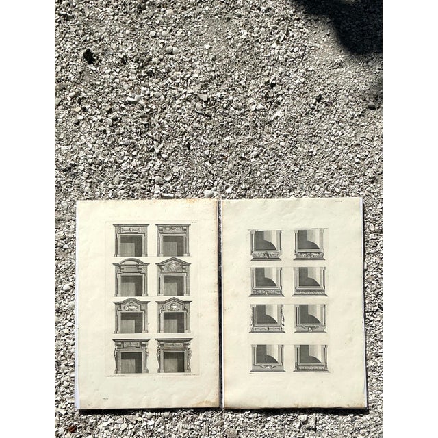 This sophisticated pair of vintage architectural prints celebrates the timeless precision of Italian Neoclassical design....
