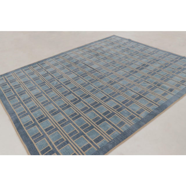 Handwoven in cotton, this 8x10 contemporary flatweave rug joins Rug & Kilim’s Dhurrie collection, featuring a modern...