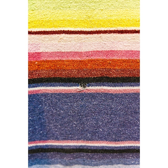 A genuine mid twentieth century hand loomed wool Puebla Saltillo sarape (zarape) blanket. Brightly colored polychrome...