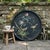 Substantial hand-painted rattan tray featuring a delicate bird and floral design set against a deep black woven ground,...