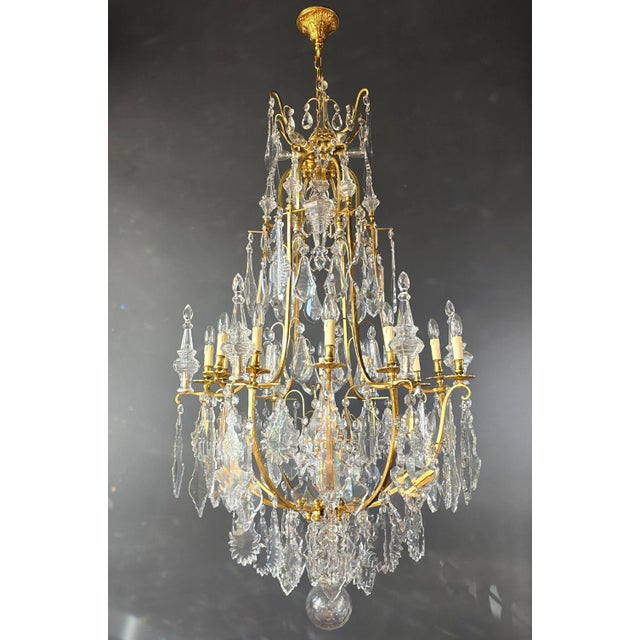 Elegant Antique Chandelier: A Testament to Craftsmanship and Grace Behold the splendor of the past revitalized in our...