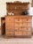 This rare 19th century English pine dairy hutch showcases a wonderfully practical and unusual form, anchored by a full...