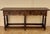 Elegant Spanish console table from the early 20th century, crafted in solid wood and inspired by traditional Baroque...