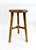 Antique three legged rustic farm stool hand-constructed from elm wood using the mortise and tenon method. Age and...