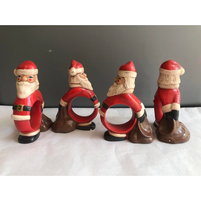 Set of Four Vintage Christmas Santa Napkin Rings Add a touch of festive charm to your holiday table with this delightful...