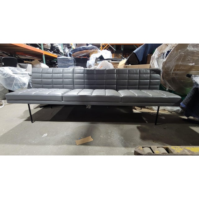 The Geiger Tuxedo Sofa embodies refined modernism with its clean lines, tailored upholstery, and impeccably balanced...