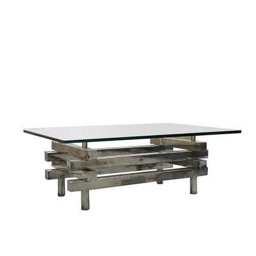 Coffee table from the 1970s made of chrome metal and glass top. Chromed metal pieces stacked and cleverly arranged....