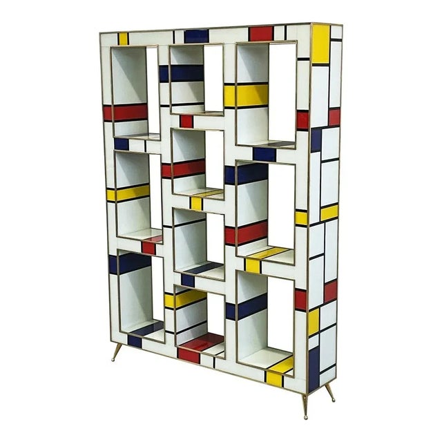 Exposed double-sided bookcase, entirely handmade, with wooden structure covered in multicolored glass (Mondrian style);...