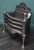 A fine English 19th century polished steel fire basket by Thomas Elsley of London, with scrolled fret set between shaped...