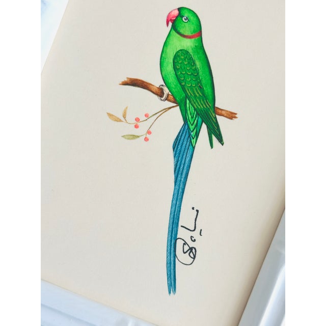 This hand-painted parrot artwork highlights clean color and fine detailing. Painted by our master artists using the finest...