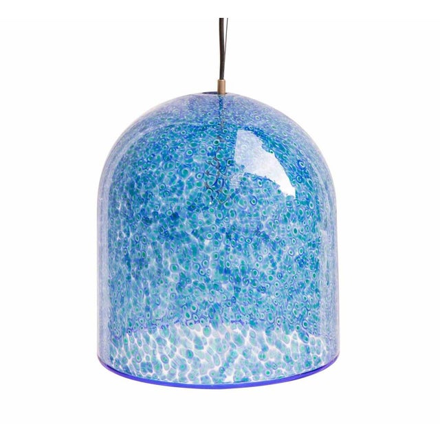 Ceiling chandelier is a design lamp realized by Gae Aulenti. Ceiling lamp of the series "Neverino". Produced by Vistosi,...