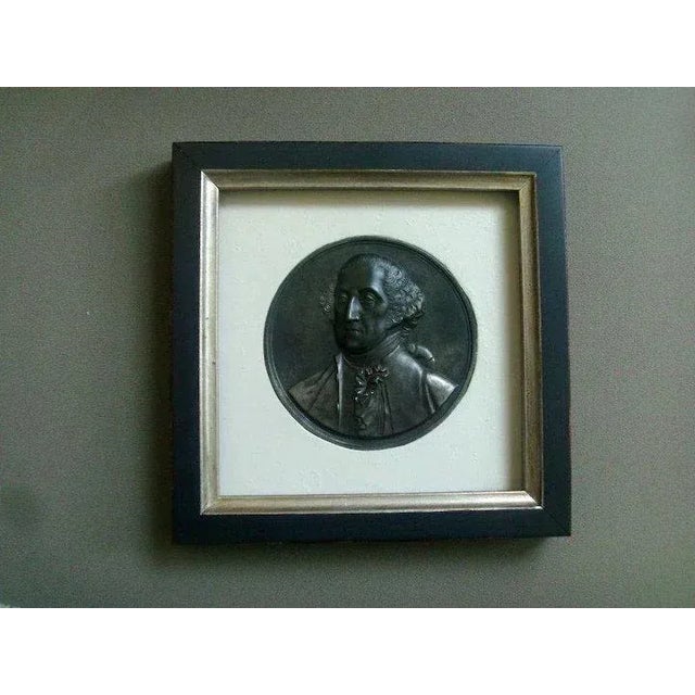 An impressive bas relief steel medallion depicting the bust of President Washington. Measures 4 1/4" in diameter....