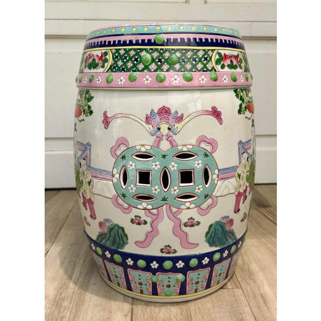 Here is a wonderful mid-20th century Chinese porcelain garden stool, beautifully hand-painted in a lively palette of pink,...