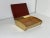 The humidor is made of brass, teak wood and is lined with cork inside. It looks very noble and can also be used...