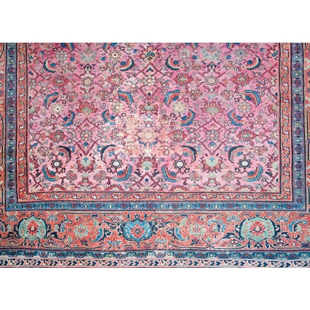 A remarkable late 19th century Persian Sarouk Farahan rug with the most incredible all-over trellis pattern with myriad...