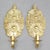 A pair of Swedish brass wall sconces from the early 20th century, featuring a refined neoclassical form with a single...