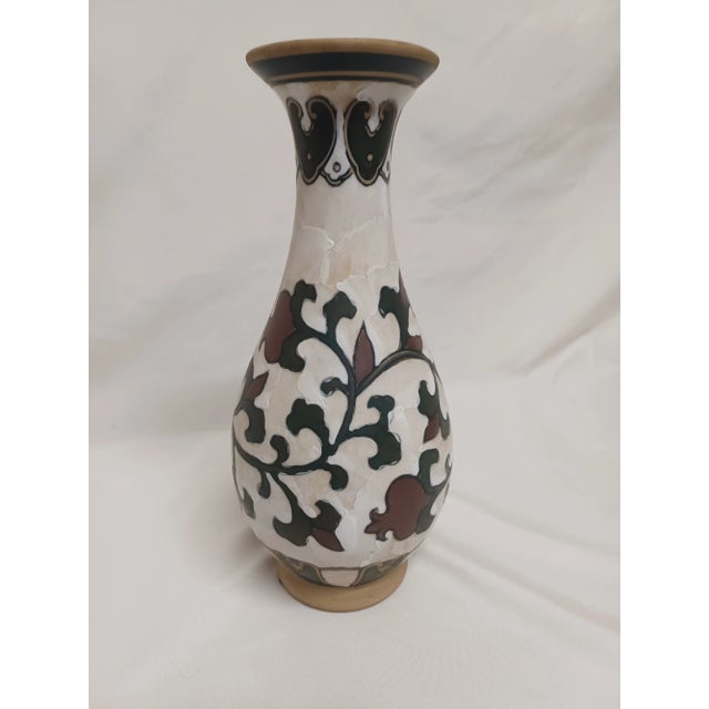 Beautiful vintage vase with floral like pattern. Appears to be possibly hand painted with an exquisite aged look. Matching...