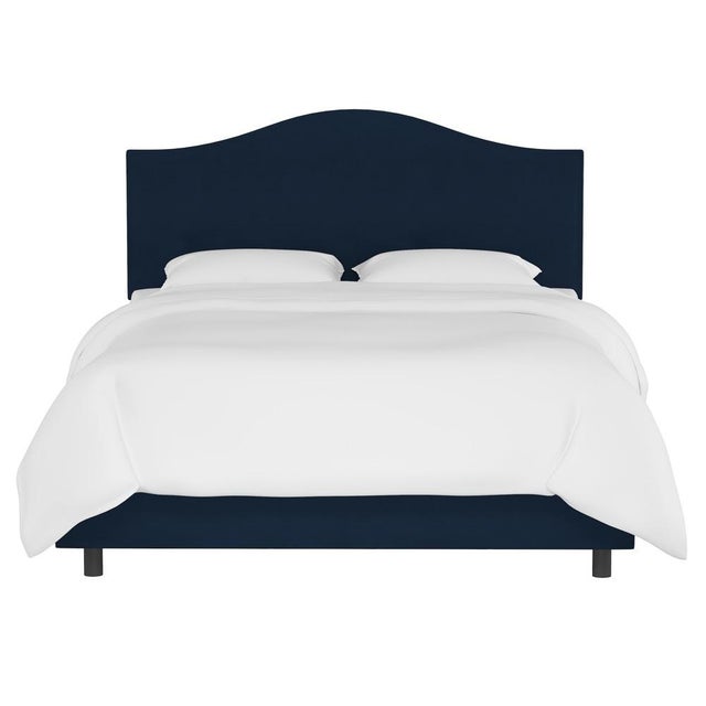 This fully upholstered bed has a unique headboard shape, allowing you to chart a course for a bedroom retreat that is at...