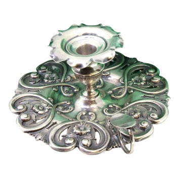 Silver Paddle with Floral Motifs and Smooth Handle For Sale