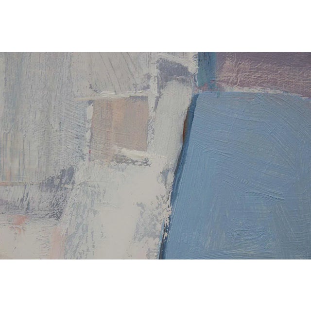 Abstract pastel toned color block painting that incorporates blue, white, and peach tones. Currently hung in a neutral...