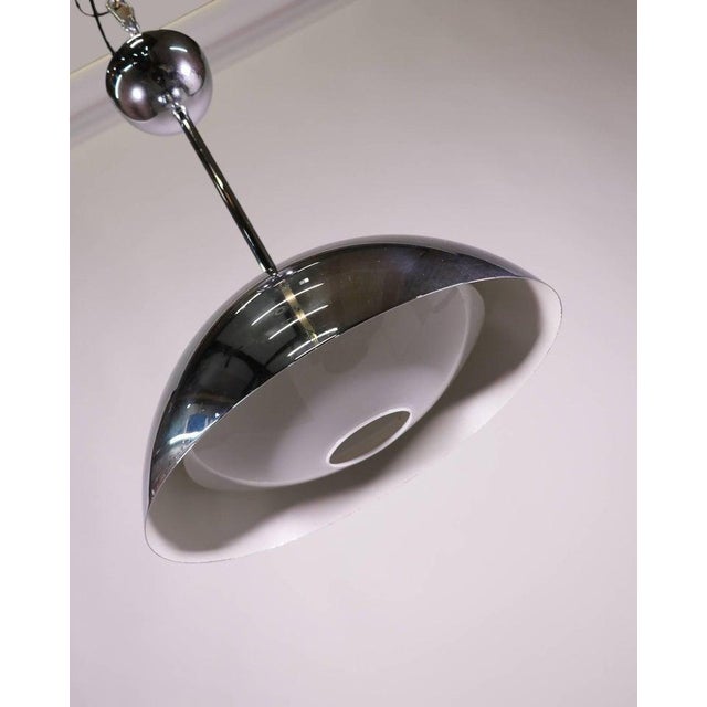 Pendant light with a chromed rod, canopy and dome shade and with a glass reflector by Glashütte Limburg with original...