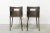 - Pair of industrial chairs - Entirely made of iron - Curved backrest with central window and four legs Labeled by...