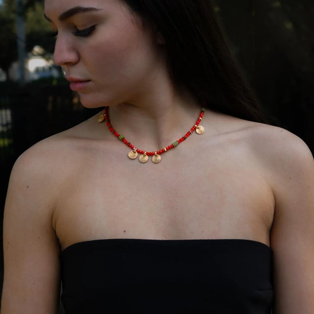 Brighten your style with our Vibrant Energy Gold Spiral Charm Choker Necklace, a bold and colorful piece designed to...