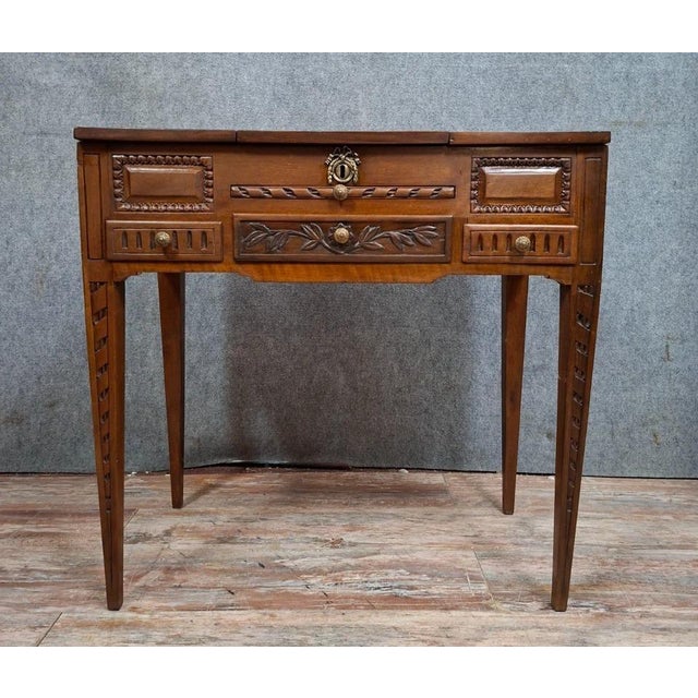 Louis xvi walnut dressing table charming louis xvi walnut dressing table, resting on four tapered legs with simulated...