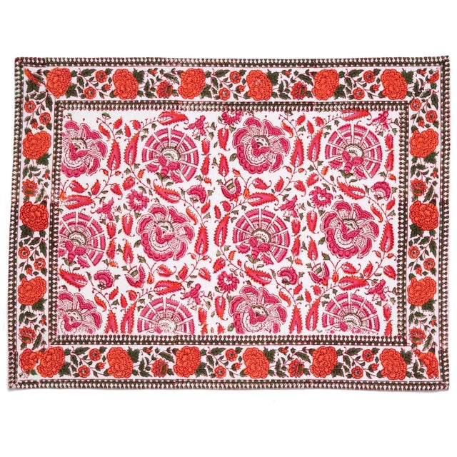 The classic Riyad design depicting elaborate flowers and vines stands out beautifully in the celebrated Indian color...