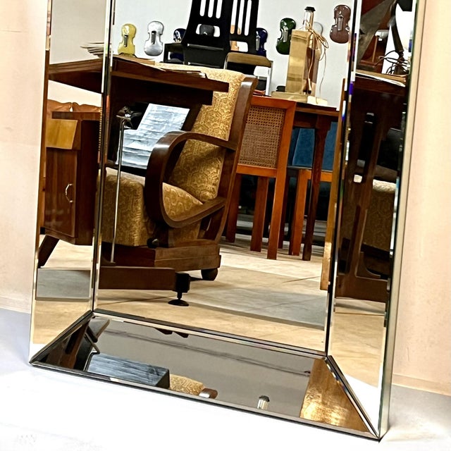 An extraordinary and monumental pair of full-length mirrors, crafted in Italy in the 1970s. This set stands out for its...