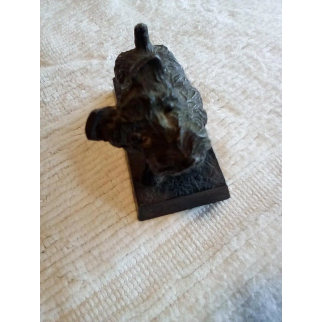 This beautiful Vintage Metal Scottish Terrier can be used as a door stop, paperweight or decorative shelf piece. Fun for...