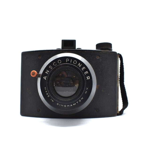 Capture a piece of mid-century photographic history with this Ansco Pioneer 616, a classic camera manufactured in...