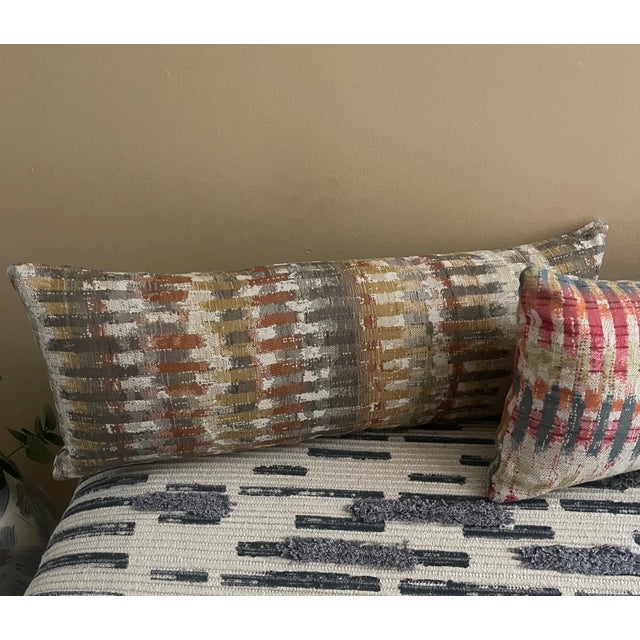 This set of three newly crafted lumbar pillows would be a spicy addition to any room or seating area. The pillows colorful...