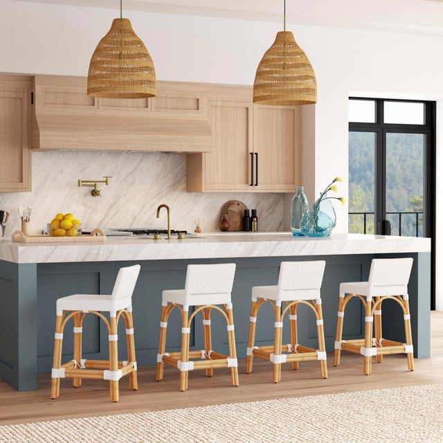 Combining clean lines with tropical materials, this Butler Specialty Company stylish low back counter stool infuses modern...