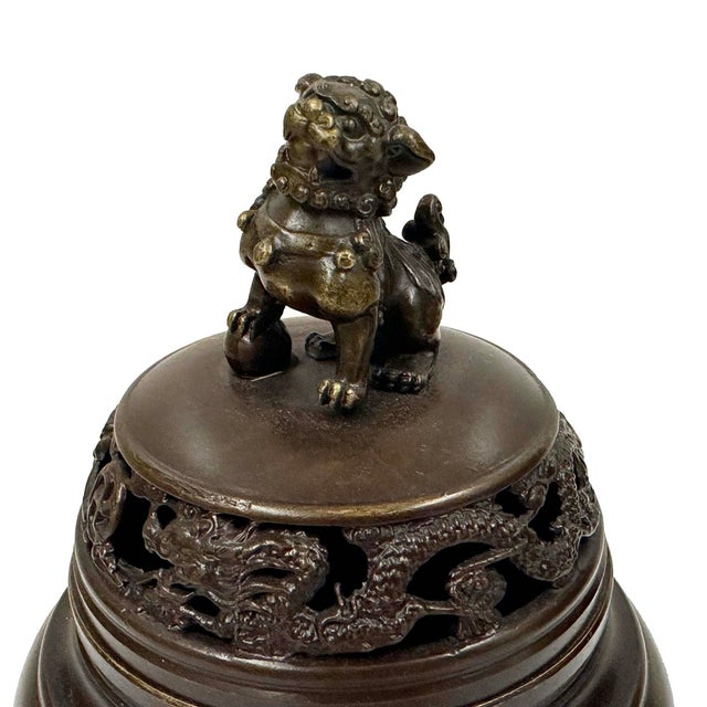 The item in the image is a vintage Chinese-style incense burner, crafted from bronze. These vessels are used in meditation...