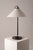 Iconic “Aggregato Tavolo” table lamp, designed in 1974 by Enzo Mari and Giancarlo Fassina for Artemide, Italy. The...