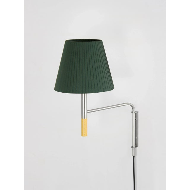 Green bc1 wall lamp by santa & cole dimensions: d 20 x w 35 x h 44 cm materials: metal, beech wood, ribbon. Available in...