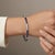 Elevate your elegance with this stunning tennis bracelet, crafted from premium platinum (PT900) and adorned with a...